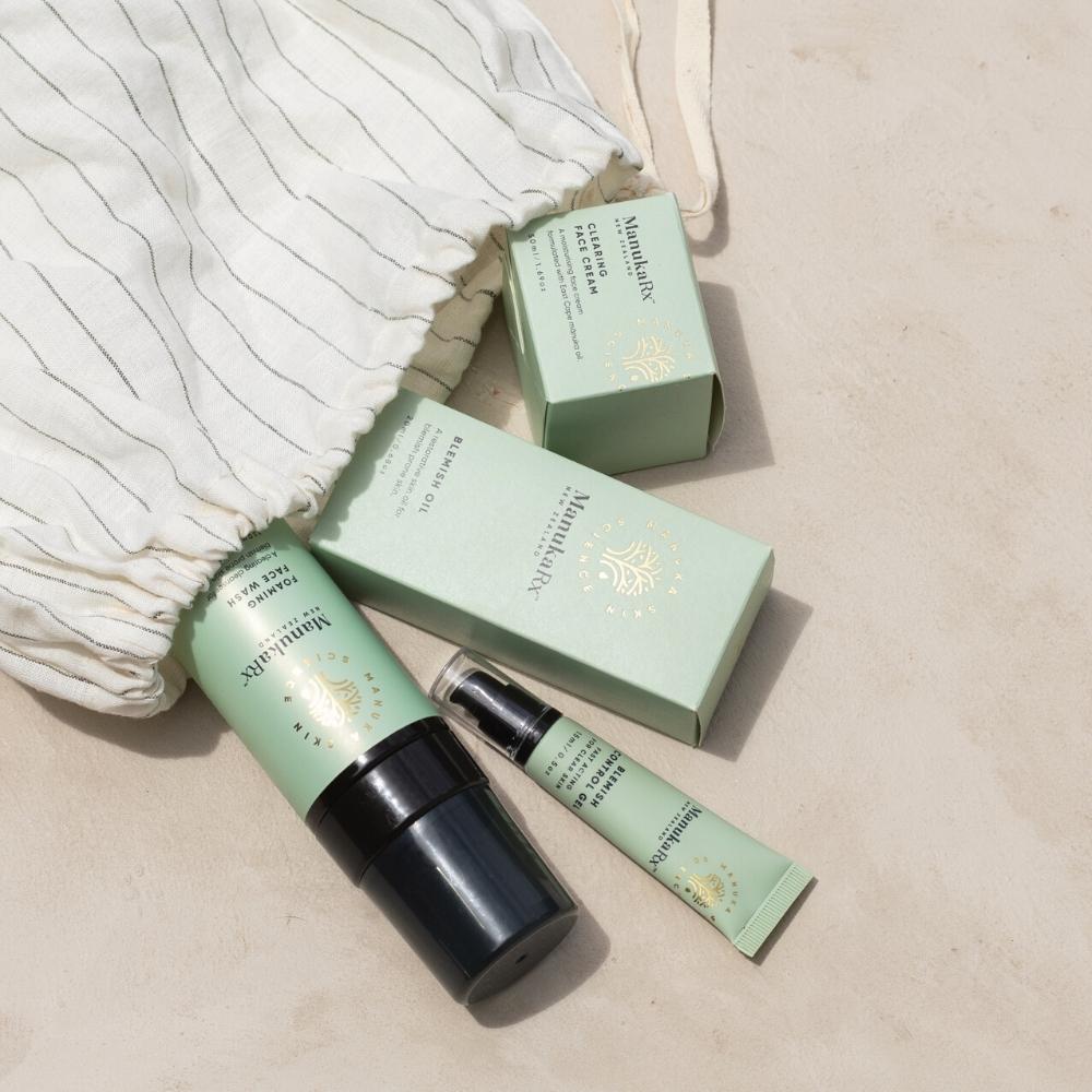 ManukaRx Ultimate Blemish Control Routine set in a cloth bag
